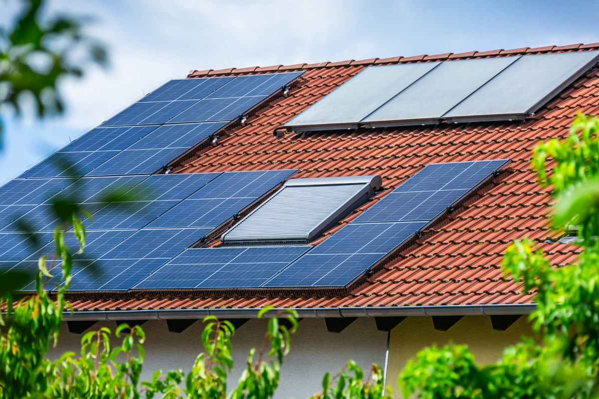 Solar panels and solar water heater on roof.