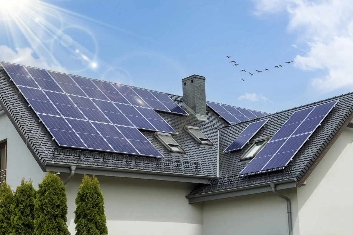 House with solar panels on roof.